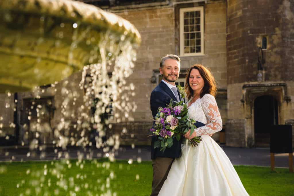 wedding-photography-thornbury-castle_15 Fountain, with bride and groom wedding photography at Thornbury Castle