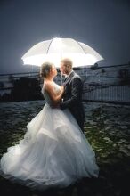 Kingscote Barn Wedding 2K Bride & Groom snow wedding photography at Kingscote Barn